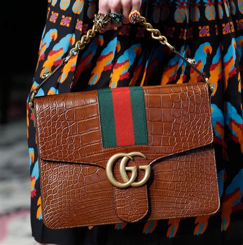 gucci hand bags images|Gucci bag publicity picture.